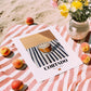 Cortado – Spanish Coffee, Konditorei Still Life, unframed on coastal sand
