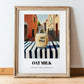 Oat Milk – Italian Street Café Scene, Dairy Poster, in wooden frame leaning on the floor