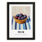 Plum – on Striped Tablecloth, Fruit Print, in sleek black frame