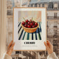 Cherry – on Striped Tablecloth, Fruit Still Life, styled in a charming Paris street view